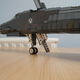 Illustration for article titled Giant LEGO B-1B Bomber Escorted by Fighters, Hawkeye Aircraft